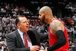 ATLANTA, GA - MAY 12:  Tom Thibodeau and Carlos Boozer #5 of the Chicago Bulls against the Atlanta Hawks in Game Six of the Eastern Conference Semifinals in the 2011 NBA Playoffs at Phillips Arena on May 12, 2011 in Atlanta, Georgia.  NOTE TO USER: User expressly acknowledges and agrees that, by downloading and/or using this photograph, User is consenting to the terms and conditions of the Getty Images License Agreement.  (Photo by Kevin C. Cox/Getty Images)