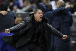 MADRID, SPAIN - APRIL 19: Head coach Diego Simeone of Atletico Madrid celebrates his sides fourth goal during the UEFA Europa League Semi Final first leg match between Atletico Madrid and Valencia at Vicente Calderon stadium on April 19, 2012 in Madrid, Spain. (Photo by Angel Martinez/Getty Images)