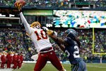 SEATTLE - NOVEMBER 27:  Jabar Gaffney #10 of the Washington Redskins attempts to pull in a pass against Richard Sherman #25of the Seattle Seahawks on November 27, 2011 at CenturyLink Field in Seattle, Washington.  (Photo by Jonathan Ferrey/Getty Images)