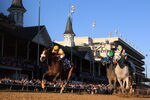 LOUISVILLE, KY - NOVEMBER 05:  Jockey Ramon Dominguez rides Hansen #5, far right, ahead of jockey Javier Castellano and Union Rags #10 to win the Breeders' Cup Juvenile during the 2011 Breeders' Cup World Championships at Churchill Downs on November 5, 2011 in Louisville, Kentucky.  (Photo by Rob Carr/Getty Images)