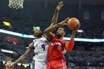 MEMPHIS, TN - MAY 02:  DeAndre Jordan #6 of the Los Angeles Clippers shoots the ball while defended  by Tony Allen #9 of the Memphis Grizzlies in Game Two of the Western Conference Quarterfinals in the 2012 NBA Playoffs at FedExForum on May 2, 2012 in Memphis, Tennessee.  NOTE TO USER: User expressly acknowledges and agrees that, by downloading and or using this photograph, User is consenting to the terms and conditions of the Getty Images License Agreement.  (Photo by Andy Lyons/Getty Images)