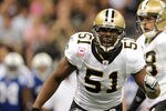 NEW ORLEANS, LA - OCTOBER 23:  Jonathan Vilma #51 of the New Orleans Saints calls a defensive play during a game against the Indianapolis Colts being held at Mercedes-Benz Superdome on October 23, 2011 in New Orleans, Louisiana.  The Saints defeated the Colts 62-7. (Photo by Stacy Revere/Getty Images)