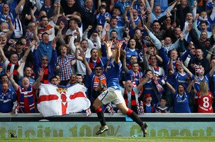 GLASGOW, SCOTLAND - MARCH 25:  Lee Wallace of Rangers celebrates after scoring his team's third goal during the Clydesdale Bank Scottish Premier League match between Rangers and Celtic at Ibrox Stadium on March 25, 2012 in Glasgow, Scotland.  (Photo by Ian Walton/Getty Images)