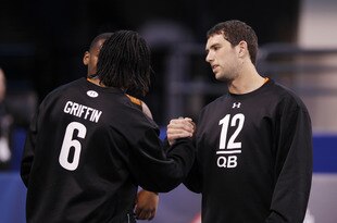INDIANAPOLIS, IN - FEBRUARY 26: Quarterbacks Andrew Luck of Stanford and Robert Griffin III of Baylor meet during the 2012 NFL Combine at Lucas Oil Stadium on February 26, 2012 in Indianapolis, Indiana. (Photo by Joe Robbins/Getty Images)