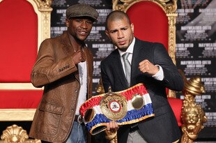 HOLLYWOOD, CA - MARCH 01:  Floyd Mayweather and Miguel Cotto pose at a press conference to promote their upcoming fight on May 5 at the MGM Grand in Las Vegas at Grauman's Chinese Theatre on March 1, 2012 in Hollywood, California.  (Photo by Jeff Gross/Getty Images)