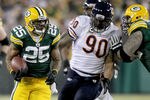 GREEN BAY, WI - DECEMBER 25:  Ryan Grant #25 of the Green Bay Packers carries the ball against the Chicago Bears at Lambeau Field on December 25, 2011 in Green Bay, Wisconsin.  (Photo by Matthew Stockman/Getty Images)