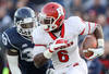 EAST HARTFORD, CT - NOVEMBER 26:  Mohamed Sanu #6 of the Rutgers Scarlet Knights carries the ball as Yawin Smallwood #33 of the Connecticut Huskies defends on November 26, 2011 at Rentschler Field in East Hartford, Connecticut. The Connecticut Huskies defeated the Rutgers Scarlet Knights 40-22.  (Photo by Elsa/Getty Images)