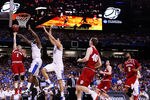 ATLANTA, GA - MARCH 23:  Jordan Hulls #1 of the Indiana Hoosiers shoots past Darius Miller #1 of the Kentucky Wildcats in the first half during the 2012 NCAA Men's Basketball South Regional Semifinal game at the Georgia Dome on March 23, 2012 in Atlanta, Georgia.  (Photo by Streeter Lecka/Getty Images)