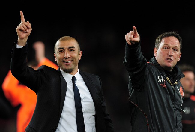 BARCELONA, SPAIN - APRIL 24: Roberto Di Matteo caretaker manager of Chelsea and assistant Steve Holland of Chelsea celebrate victory at the final whistle during the UEFA Champions League Semi Final, second leg match between FC Barcelona and Chelsea FC at Camp Nou on April 24, 2012 in Barcelona, Spain. (Photo by Shaun Botterill/Getty Images)