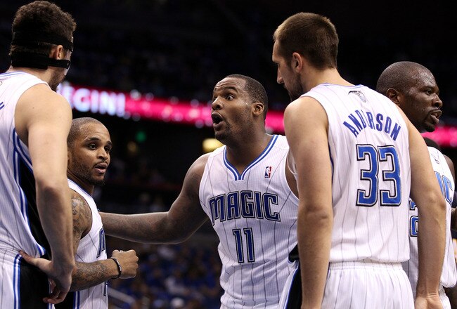ORLANDO, FL - MAY 02:  Guard Jameer Nelson #14, Center Glen Davis #11 and Forward Ryan Anderson #33 of the Orlando Magic react against the Indiana Pacers in Game Three of the Eastern Conference Quarterfinals in the 2012 NBA Playoffs at Amway Center on May 2, 2012 in Orlando, Florida. The Pacers defeated the Magic 97-74.  NOTE TO USER: User expressly acknowledges and agrees that, by downloading and or using this photograph, User is consenting to the terms and conditions of the Getty Images License Agreement.  (Photo by Marc Serota/Getty Images)