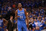 DALLAS, TX - MAY 03:  Kevin Durant #35 of the Oklahoma City Thunder reacts against the Dallas Mavericks during Game Three of the Western Conference Quarterfinal at American Airlines Center on May 3, 2012 in Dallas, Texas.  NOTE TO USER: User expressly acknowledges and agrees that, by downloading and or using this photograph, User is consenting to the terms and conditions of the Getty Images License Agreement.  (Photo by Ronald Martinez/Getty Images)