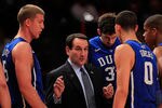 NEW YORK - NOVEMBER 15:  Head coach Mike Krzyzewski of the Duke Blue Devils talks with his team during a time out against the Michigan State Spartans during the 2011 State Farms Champions Classic at Madison Square Garden on November 15, 2011 in New York City.  (Photo by Chris Trotman/Getty Images)