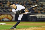 NEW YORK, NY - APRIL 30:  David Robertson #30 of the New York Yankees pitches against the Baltimore Orioles during their game on April 30, 2012 at Yankee Stadium in the Bronx borough of New York City.  (Photo by Al Bello/Getty Images)