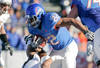 BOISE, ID - NOVEMBER 26: Doug Martin #22 of the Boise State Broncos runs the ball against the Wyoming Cowboys at Bronco Stadium on November 26, 2011 in Boise, Idaho.  (Photo by Otto Kitsinger III/Getty Images)