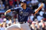 BOSTON, MA - APRIL 13:  David Price #14 of the Tampa Bay Rays delivers a pitch against the Boston Red Sox during the home opener on April 13, 2012 at Fenway Park in Boston, Massachusetts.  (Photo by Elsa/Getty Images)