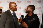INDIANAPOLIS, IN - FEBRUARY 04:  Former NFL player Amani Toomer (L) and NFL player Greg Jennings attend The Maxim Party featuring The Coke Zero Countdown presented by Patron Tequila at Indiana State Fairgrounds on February 4, 2012 in Indianapolis, Indiana.  (Photo by Daniel Boczarski/Getty Images for Coke Zero)
