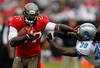 TAMPA, FL - DECEMBER 19:  Running back LeGarrette Blount #27 of the Tampa Bay Buccaneers straight-arms safety C.C. Brown #39 of the Detroit Lions during the game at Raymond James Stadium on December 19, 2010 in Tampa, Florida.  (Photo by J. Meric/Getty Images)