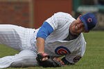 CHICAGO, IL - MAY 04:  Starting pitcher Paul Maholm #28 of the Chicago Cubs reacts after being hit in the leg on a ball by Dee Gordon of the Los Angeles Dodgers at Wrigley Field on May 4, 2012 in Chicago, Illinois.  (Photo by Jonathan Daniel/Getty Images)