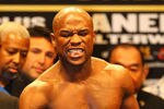 LAS VEGAS, NV - MAY 04:  Boxer Floyd Mayweather Jr. poses during the official weigh-in for his bout against WBA super welterweight champion Miguel Cotto at the MGM Grand Garden Arena on May 4, 2012 in Las Vegas, Nevada. Mayweather will challenge Cotto for his title on May 5, 2012 in Las Vegas.  (Photo by Al Bello/Getty Images)