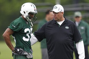 FLORHAM PARK, NJ - MAY 04:  New York Jets head coach Rex Ryan talks with Antonio Allen #39 during the Jets Rookie Minicamp on May 4, 2012 in Florham Park, New Jersey.  (Photo by Jeff Zelevansky/Getty Images)