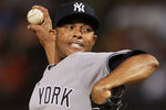 ARLINGTON, TX - APRIL 23:  Mariano Rivera #42 of the New York Yankees throws against the Texas Rangers at Rangers Ballpark in Arlington on April 23, 2012 in Arlington, Texas.  (Photo by Ronald Martinez/Getty Images)