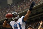 NEW ORLEANS, LA - JANUARY 07:  Calvin Johnson #81 of the Detroit Lions celebrates after scoring a touchdown in the second quarter against the New Orleans Saints during their 2012 NFC Wild Card Playoff game at Mercedes-Benz Superdome on January 7, 2012 in New Orleans, Louisiana.  (Photo by Ronald Martinez/Getty Images)