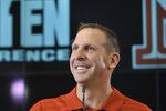 LINCOLN, NE. - JUNE 11:  University of Nebraska football coach Bo Pelini jokes with members of the media at a press conference announcing Nebraska accepting an invitation to join the Big Ten Conference June 11, 2010  in Lincoln, Nebraska.  The university will begin integration immediately and start athletic competition as soon as 2011. (Photo by Eric Francis/Getty Images)