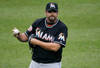 NEW YORK, NY - APRIL 26: Heath Bell #21 of the Miami Marlins looks on during the game against the New York Mets at Citi Field on April 26, 2012 in the Flushing neighborhood of the Queens borough of New York City. Mets defeated the Marlins 3-2.  (Photo by Mike Stobe/Getty Images)