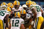 SAN DIEGO, CA - NOVEMBER 6:  Quarterback Aaron Rodgers #12 of the Green Bay Packers in the huddle during the 4th quarter of the game against the San Diego Chargers NFL Game on November 6, 2011 at Qualcomm Stadium in San Diego, California.  (Photo by Donald Miralle/Getty Images)