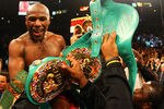 LAS VEGAS, NV - MAY 05:  Floyd Mayweather Jr. celebrates after defeating Miguel Cotto by unanimous decision during their WBA super welterweight title fight at the MGM Grand Garden Arena on May 5, 2012 in Las Vegas, Nevada.  (Photo by Al Bello/Getty Images)