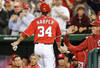 WASHINGTON, DC - MAY 06:  Bryce Harper #34 of the Washington Nationals celebrates with manager Davey Johnson after stealing home plate in the first inning against the Philadelphia Phillies at Nationals Park on May 6, 2012 in Washington, DC.  (Photo by Greg Fiume/Getty Images)