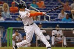 MIAMI, FL - APRIL 29: Giancarlo Stanton #27 of the Miami Marlins hits a home run in the ninth inning during a game against the Arizona Diamondbacks at Marlins Park on April 29, 2012 in Miami, Florida. The Arizona Diamondbacks defeated the Miami Marlins 8-4. (Photo by Sarah Glenn/Getty Images)