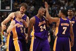 DENVER, CO - MAY 06:  Steve Blake #5, Pau Gasol #16, Kobe Bryant # 24, Ramon Sessions #7 and Andrew Bynum #17 of the Los Angeles Lakers celebrate their victory over the Denver Nuggets in Game Four of the Western Conference Quarterfinals in the 2012 NBA Playoffs at Pepsi Center on May 6, 2012 in Denver, Colorado. The Lakers defeated the Nuggets 92-88 to take a 3-1 lead in the series. NOTE TO USER: User expressly acknowledges and agrees that, by downloading and or using this photograph, User is consenting to the terms and conditions of the Getty Images License Agreement.  (Photo by Doug Pensinger/Getty Images)