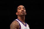 NEW YORK, NY - MARCH 28: J.R. Smith #8 of the New York Knicks looks on against the Orlando Magic at Madison Square Garden on March 28, 2012 in New York City. NOTE TO USER: User expressly acknowledges and agrees that, by downloading and/or using this Photograph, user is consenting to the terms and conditions of the Getty Images License Agreement.  (Photo by Chris Trotman/Getty Images)