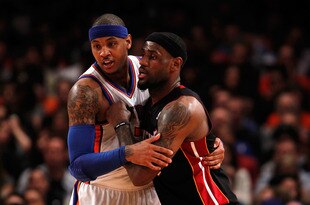 NEW YORK, NY - MAY 06:  Carmelo Anthony #7 of the New York Knicks fights for position against LeBron James #6 of the Miami Heat in the first half of Game Four of the Eastern Conference Quarterfinals in the 2012 NBA Playoffs on May 6, 2012 at Madison Square Garden in New York City. NOTE TO USER: User expressly acknowledges and agrees that, by downloading and or using this photograph, User is consenting to the terms and conditions of the Getty Images License Agreement  (Photo by Jeff Zelevansky/Getty Images)