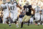 SOUTH BEND, IN - SEPTEMBER 17: Robert Blanton of the Notre Dame Fighting Irish returns an interception 82-yards while playing the Michigan State Spartans during the second half September 17, 2011at Notre Dame Stadium in South Bend, Indiana. Notre Dame defeated Michigan State 31-13. (Photo by John Gress/Getty Images)