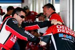 TALLADEGA, AL - MAY 04:  Tony Stewart, driver of the #14 Office Depot/Mobil 1 Chevrolet, jokes with a crew member in the garage area during practice for the NASCAR Sprint Cup Series Aaron's 499 at Talladega Superspeedway on May 4, 2012 in Talladega, Alabama.  (Photo by Kevin C. Cox/Getty Images for NASCAR)