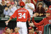 WASHINGTON, DC - MAY 06:  Bryce Harper #34 of the Washington Nationals celebrates with manager Davey Johnson after stealing home plate in the first inning against the Philadelphia Phillies at Nationals Park on May 6, 2012 in Washington, DC.  (Photo by Greg Fiume/Getty Images)
