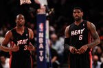 NEW YORK, NY - MAY 06: (L-R) Dwyane Wade #3 and LeBron James #6 of the Miami Heat look on against the New York Knicks  in Game Four of the Eastern Conference Quarterfinals in the 2012 NBA Playoffs on May 6, 2012 at Madison Square Garden in New York City. NOTE TO USER: User expressly acknowledges and agrees that, by downloading and or using this photograph, User is consenting to the terms and conditions of the Getty Images License Agreement  (Photo by Jeff Zelevansky/Getty Images)