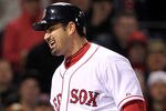 BOSTON, MA - MAY 2:  Adrian Gonzalez #28 of the Boston Red Sox reacts after he struck out with the bases loaded in the seventh inning against the Oakland Athletics at Fenway Park May 2, 2012  in Boston, Massachusetts. (Photo by Jim Rogash/Getty Images)