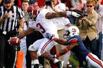 AUBURN, AL - NOVEMBER 26:  Trent Richardson #3 of the Alabama Crimson Tide scores a touchdown against Jonathon Mincy #6 of the Auburn Tigers at Jordan-Hare Stadium on November 26, 2011 in Auburn, Alabama.  (Photo by Kevin C. Cox/Getty Images)