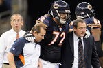 NEW ORLEANS, LA - SEPTEMBER 18:  Gabe Carimi #72 of the Chicago Bears is helped off the field at the Louisiana Superdome on September 18, 2011 in New Orleans, Louisiana.  The Saints defeated the Bears 30-13.(Photo by Stacy Revere/Getty Images)