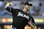 SAN DIEGO, CA - MAY 4: Josh Johnson #55 of the Miami Marlins pitches during the first inning of a baseball game against the San Diego Padres at Petco Park on May 4, 2012 in San Diego, California.  (Photo by Denis Poroy/Getty Images)