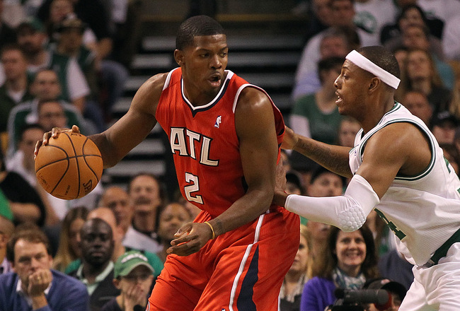 BOSTON, MA - MAY 04:  Joe Johnson #2 of the Atlanta Hawks works his way to the basket against Paul Pierce #34 of the Boston Celtics in Game Three of the Eastern Conference Quarterfinals during the 2012 NBA Playoffs on May 4, 2012 at TD Garden in Boston, Massachusetts. NOTE TO USER: User expressly acknowledges and agrees that, by downloading and or using this photograph, User is consenting to the terms and conditions of the Getty Images License Agreement. (Photo by Jim Rogash/Getty Images)