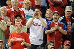 WASHINGTON, DC - MAY 06:  Fans of the Philadelphia Phillies cheer during the game against the Washington Nationals at Nationals Park on May 6, 2012 in Washington, DC.  (Photo by Greg Fiume/Getty Images)