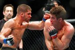 MONTREAL- MAY 8:Jeremy Stephens (L) punches Sam Stout in their lightweight 'swing' bout at UFC 113 at Bell Centre on May 8, 2010 in Montreal, Quebec, Canada. Jeremy Stephens won the bout by KO. (Photo by Richard Wolowicz/Getty Images)