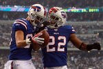 ARLINGTON, TX - NOVEMBER 13:  (L-R) David Nelson #86 of the Buffalo Bills and Fred Jackson #22 celebrate a touchdown against the Dallas Cowboys at Cowboys Stadium on November 13, 2011 in Arlington, Texas.  (Photo by Ronald Martinez/Getty Images)