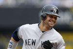 KANSAS CITY, MO - MAY 6:  Nick Swisher #33 of the New York Yankees smiles as he rounds third after hitting a home run against the Kansas City Royals at Kauffman Stadium May 6, 2012 in Kansas City, Missouri. (Photo by Ed Zurga/Getty Images)