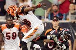 HOUSTON, TX - JANUARY 07:  Danieal Manning #38 of the Houston Texans intercepts a pass against A.J. Green #18 of the Cincinnati Bengals during their 2012 AFC Wild Card Playoff game at Reliant Stadium on January 7, 2012 in Houston, Texas.  (Photo by Bob Levey/Getty Images)