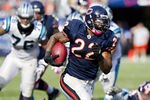 CHICAGO, IL - OCTOBER 2:   Matt Forte #22 of the Chicago Bears runs the ball against the Carolina Panthers at the Soldier Field on October 2, 2011 in Chicago, Illinois.  The Bears defeated the Panthers 34 to 29.  (Photo by Wesley Hitt/Getty Images)